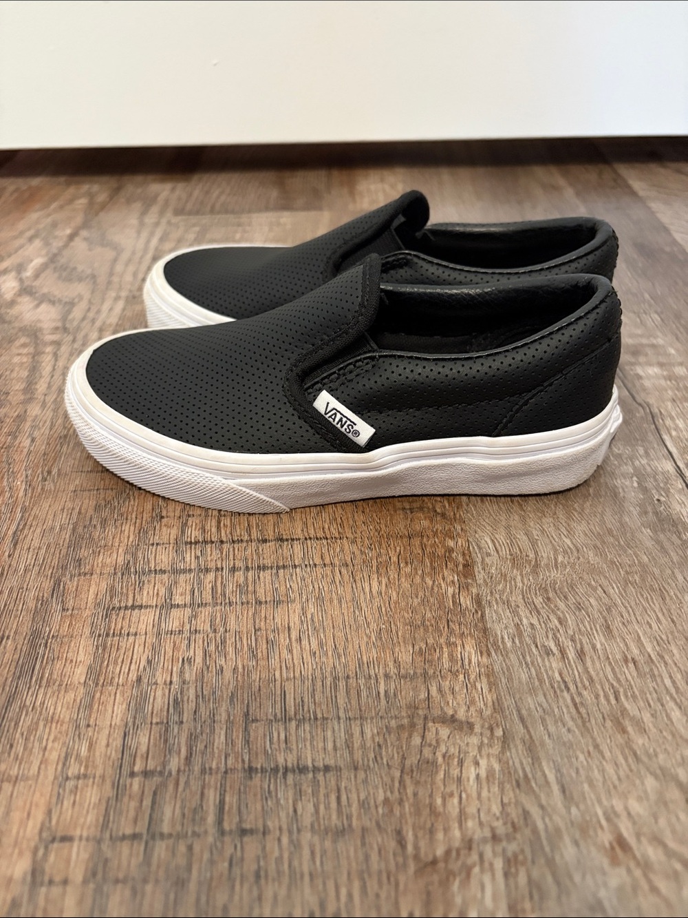 Vans Black Perforated Slip-On Loafers with White Sole